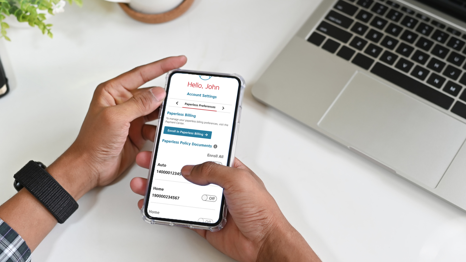 A phone showing MyAlfa account settings on the Paperless Preferences. 