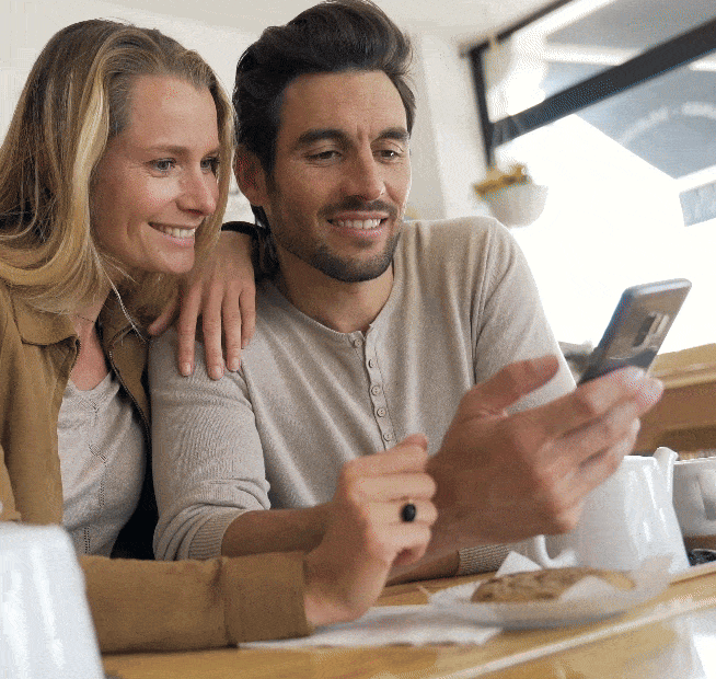 Couple looking at phone